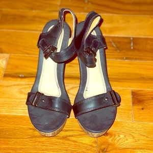 Black heeled sandals with faux wooden platform